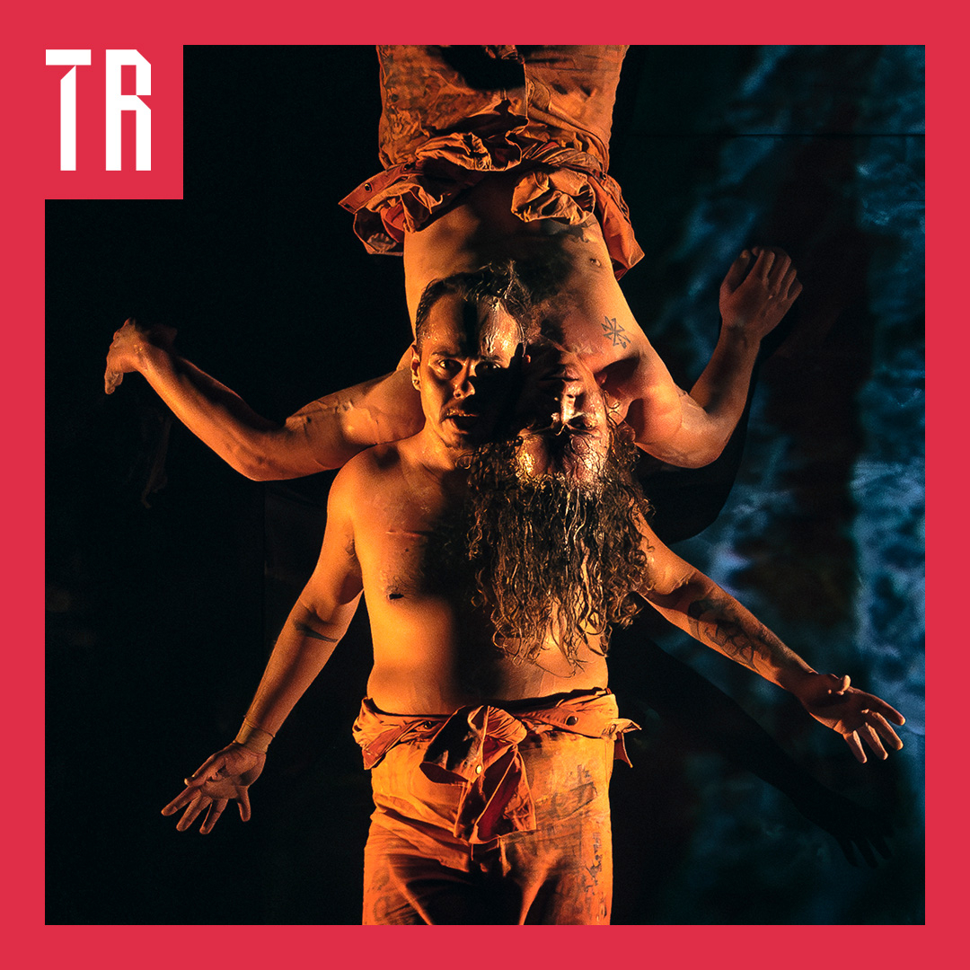 Pictured Chandler Connell (Wiradjuri & Ngunnawal) and Alexander Abbot. Image by Gregory Lorenzutti Two male dancers perform a stunt wher eone is resting on the others shoulders in an upside down headstand.