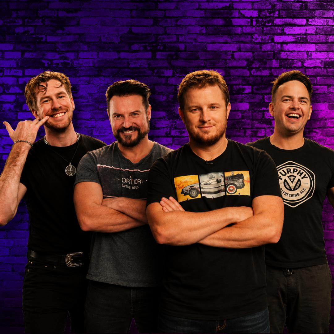 Image: supplied Four male comedians stand in a row, two gave their arms crossed all are smiling. They are wearing dark coloured t-shirts